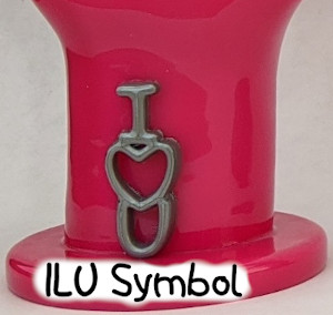 detail photo of metallic silver i love you symbol on magenta i love you hand